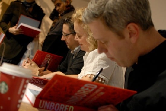 From left: Joshua Glenn, Elizabeth Foy Larsen, Tony Leone signing copies of UNBORED in 2012.