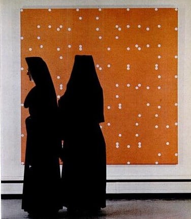 Nuns standing in front of a Poons painting, c. 1963