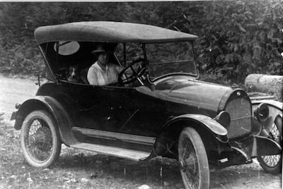 Mrs.-Norwood-School-Secretary-driving-a-Whippet-car