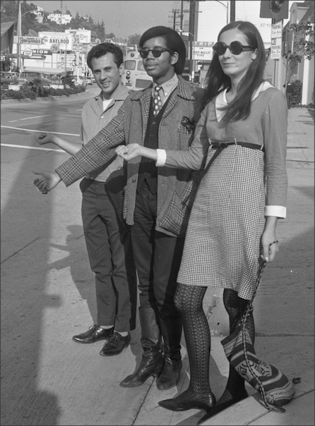 Teenagers hitchhiking on the Sunset Strip, 1966.