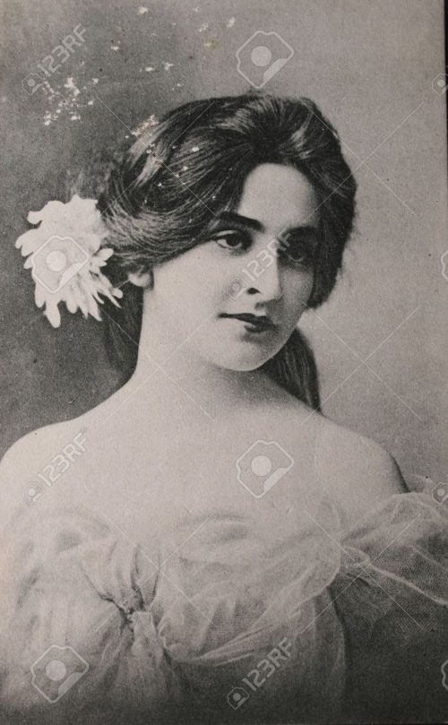 9158221-Original-postcard-of-gorgeous-young-woman-in-1910-in-black-and--Stock-Photo